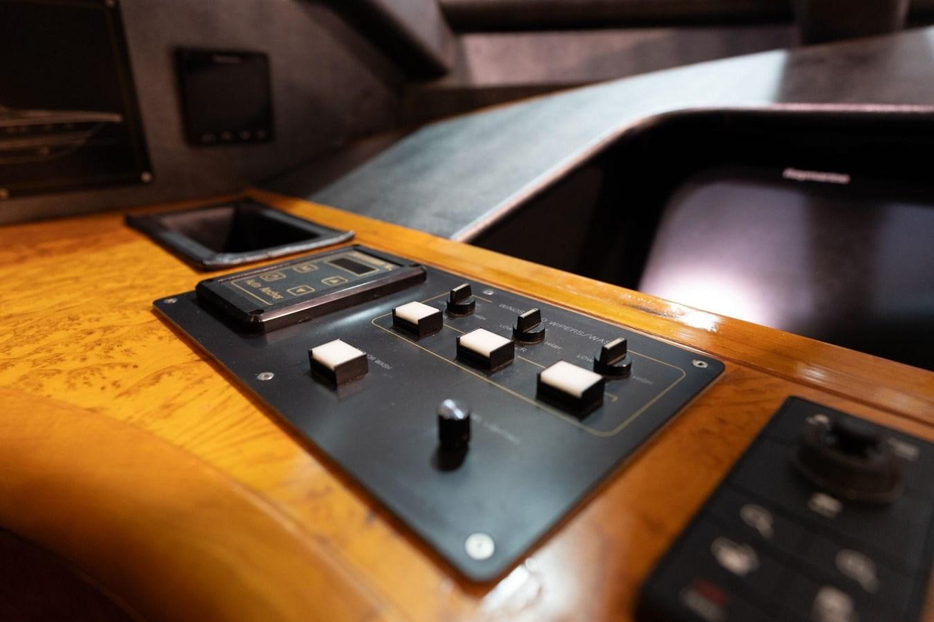 a black and white video game console aboard 1996 ADMIRAL MARINE 71 Yacht for Sale