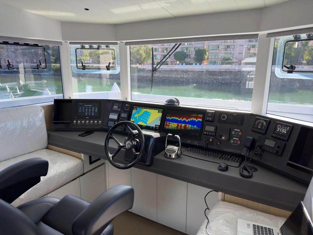 inside of a car aboard BUNDALONG Yacht for Sale