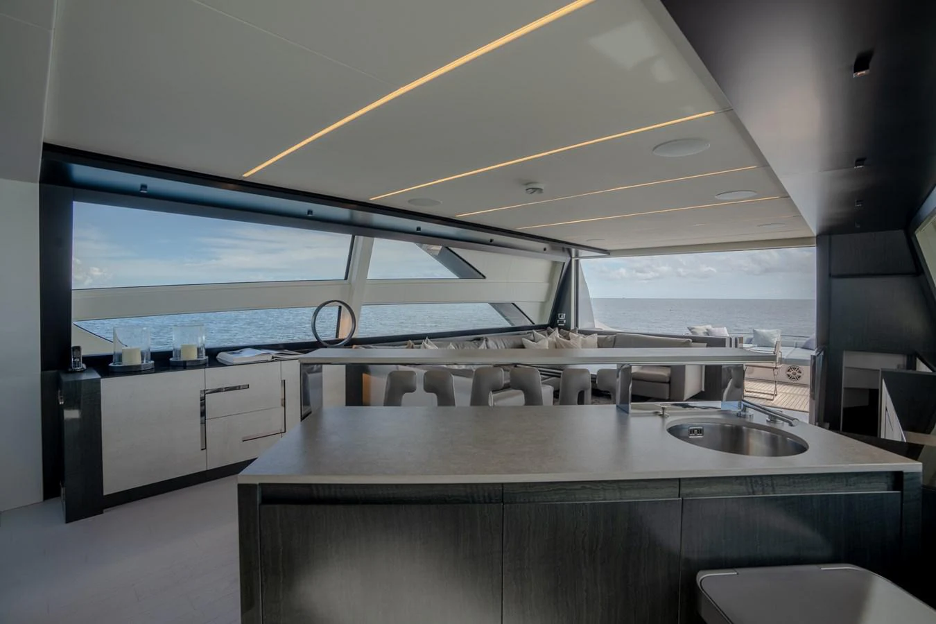 a kitchen with a large window aboard VINTAGE Yacht for Sale