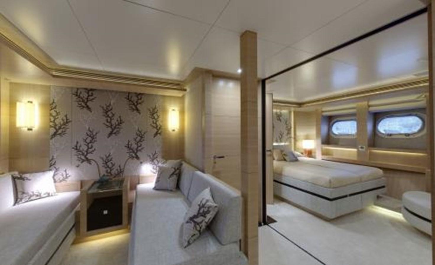 a room with a couch and a bed aboard BDJ Yacht for Sale