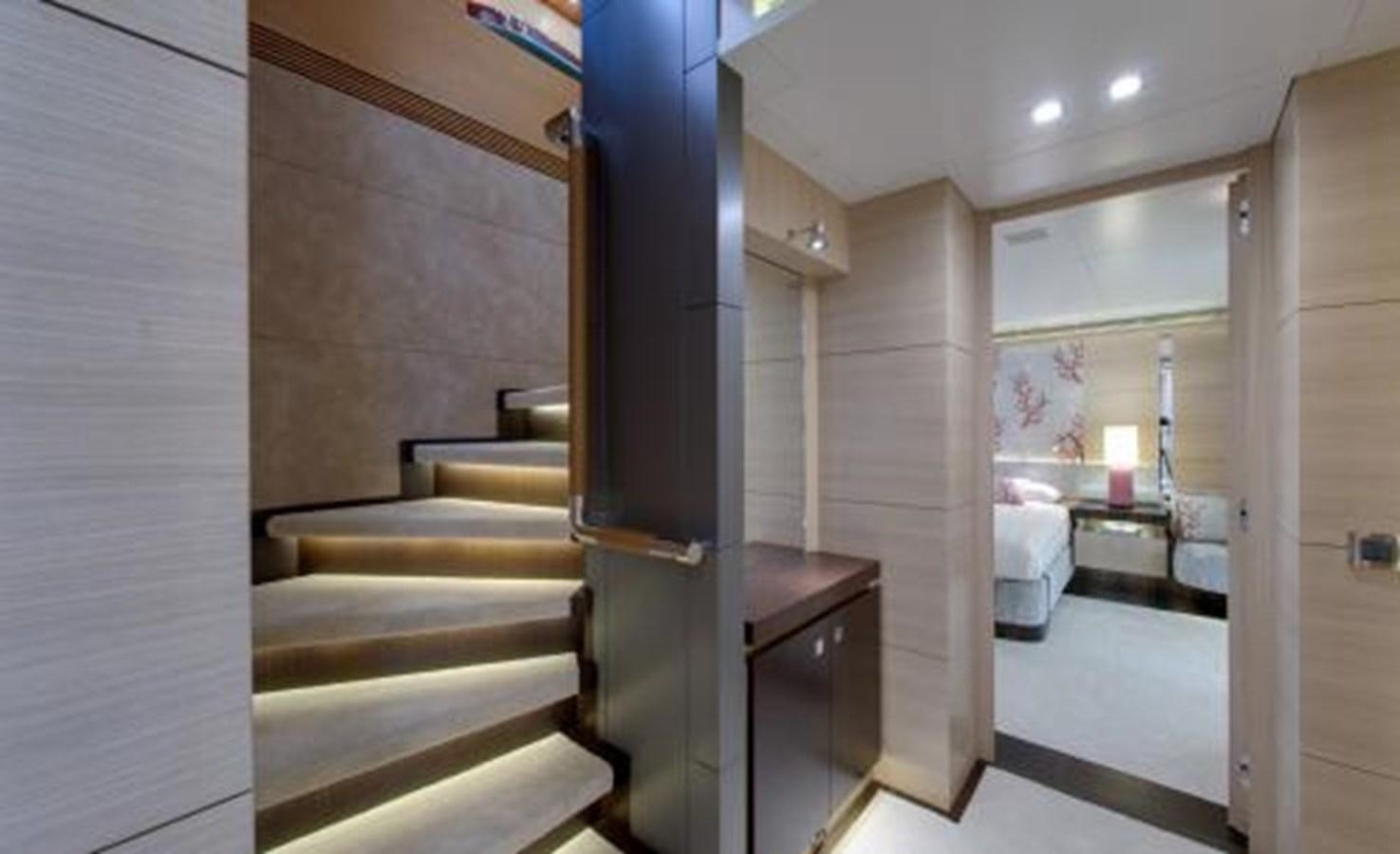 a room with a couch and a table aboard BDJ Yacht for Sale