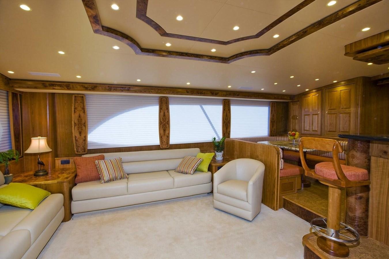 a living room with a large window aboard ANN WARRICK Yacht for Sale