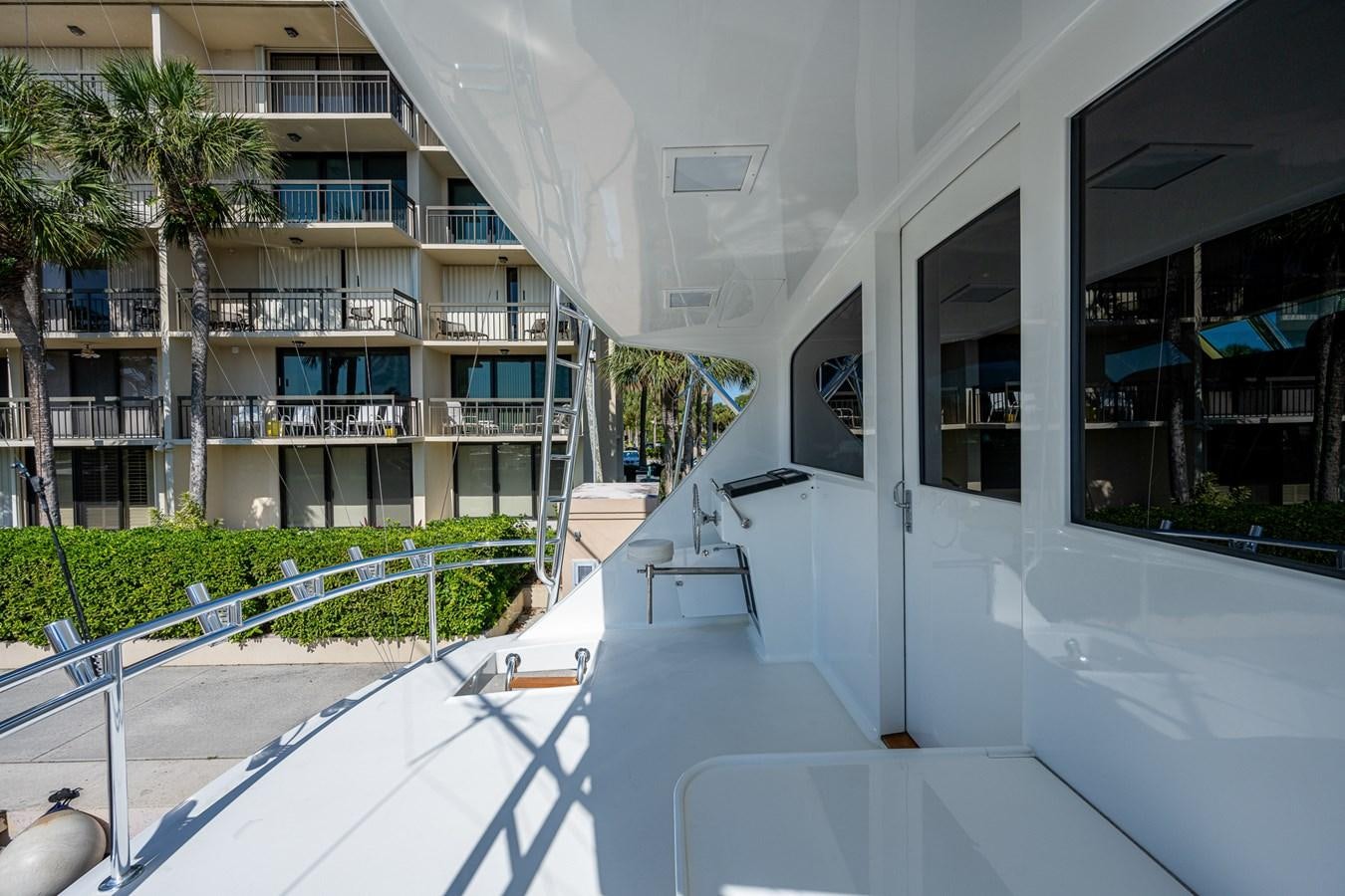 a balcony with a pool aboard DON TEO Yacht for Sale