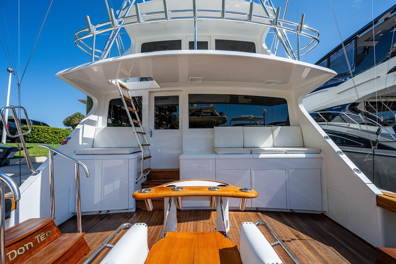 a white boat on a deck aboard DON TEO Yacht for Sale