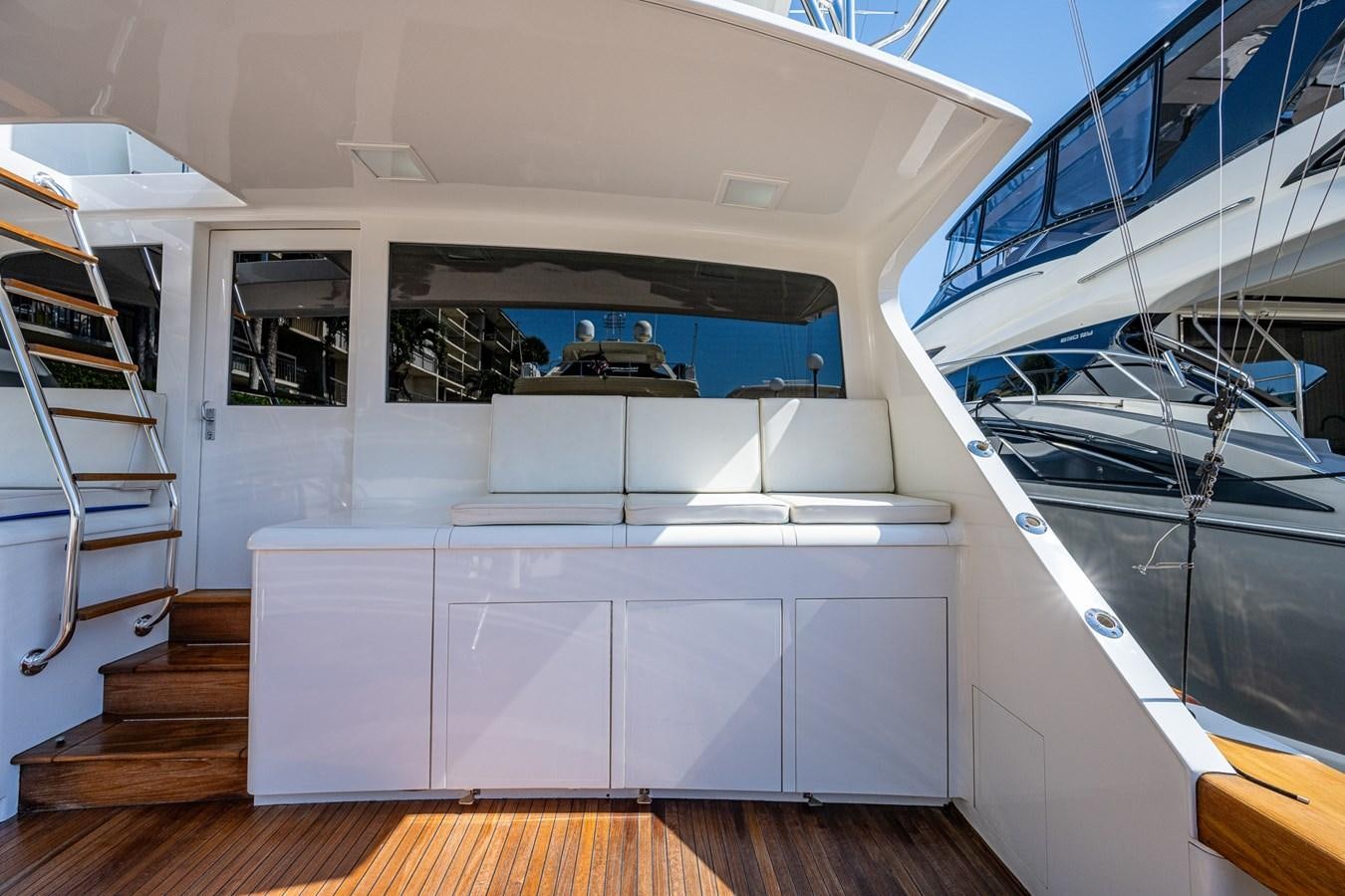 a white house with a staircase aboard DON TEO Yacht for Sale