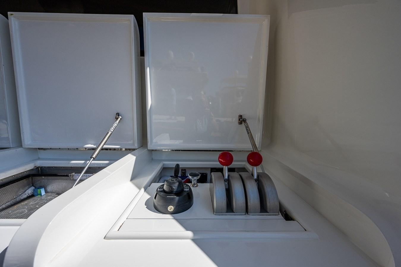 a computer with a mouse and a computer monitor aboard DON TEO Yacht for Sale