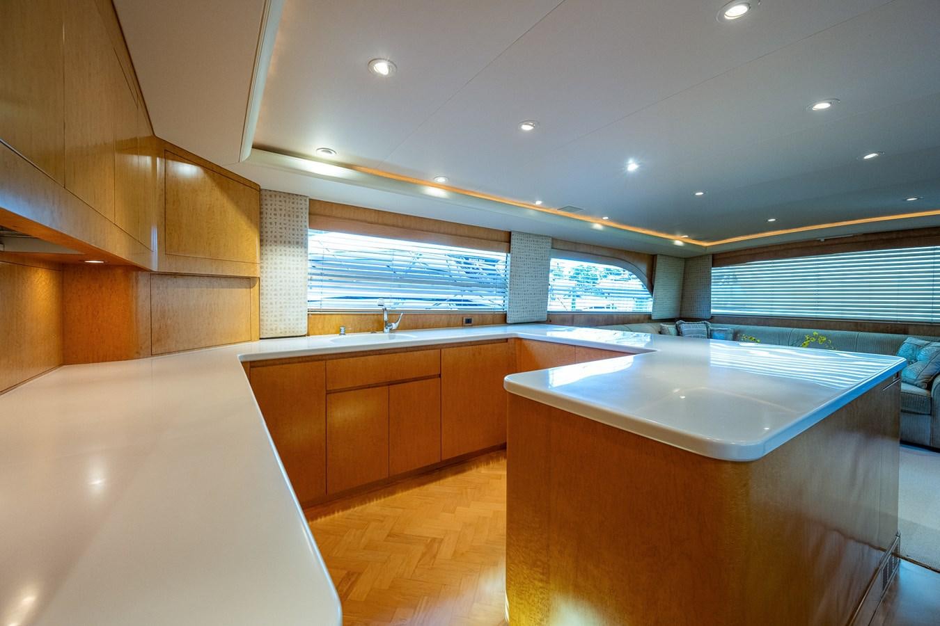 a large kitchen with a large island aboard DON TEO Yacht for Sale