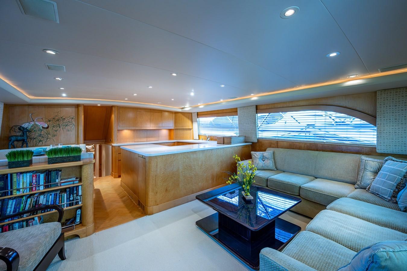 a living room with a couch and a coffee table aboard DON TEO Yacht for Sale