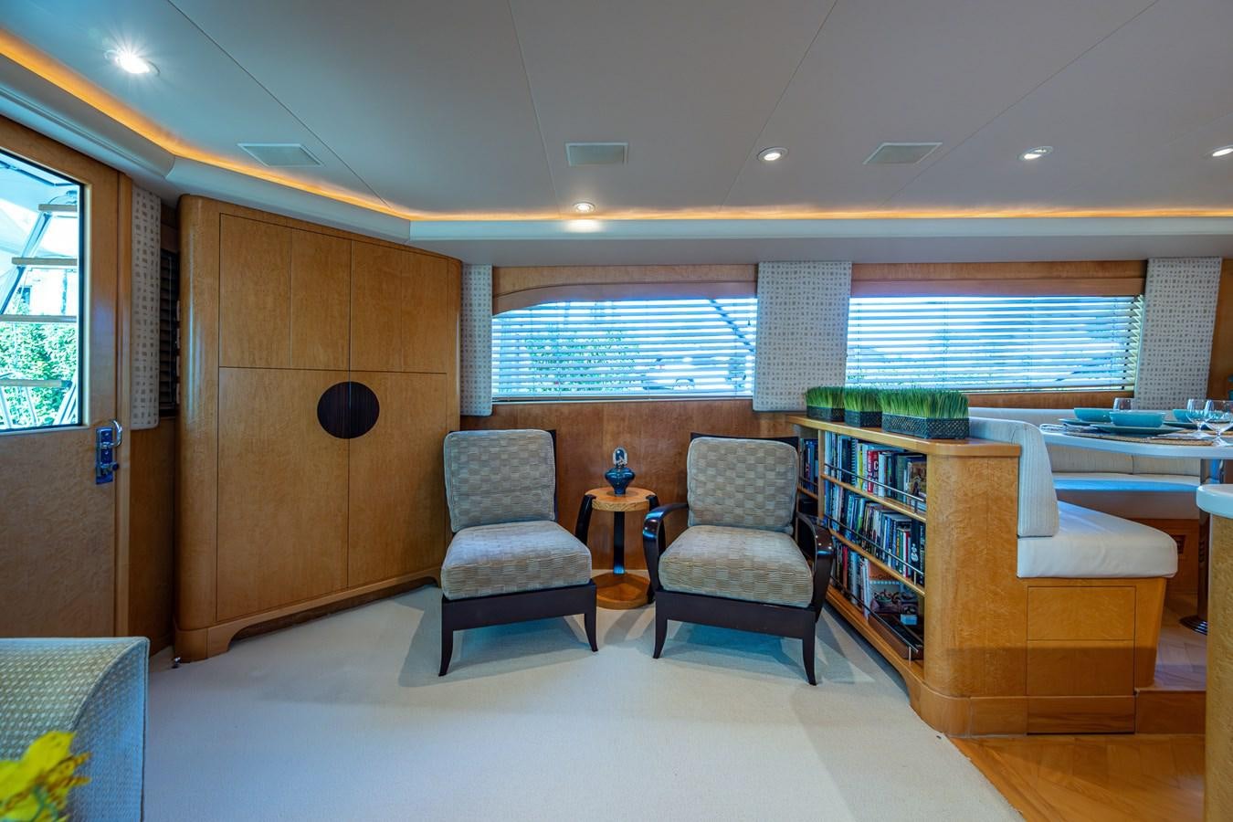 a room with chairs and a table aboard DON TEO Yacht for Sale
