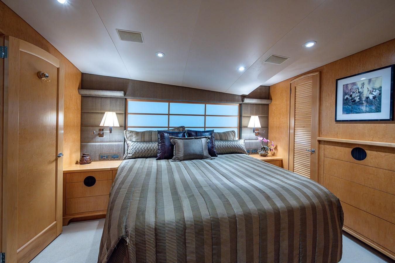 a large bedroom with a large bed aboard DON TEO Yacht for Sale