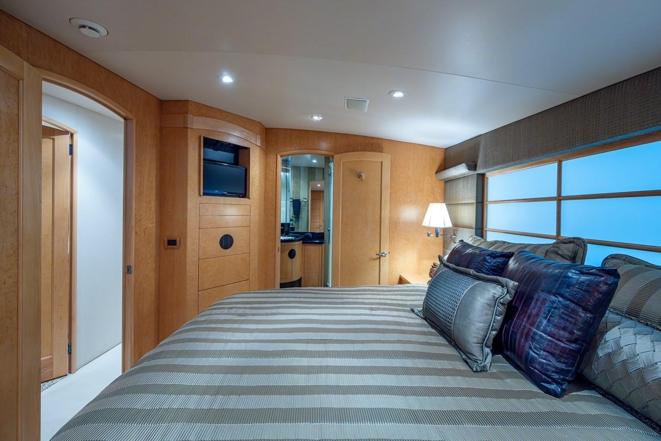 a bed in a room aboard DON TEO Yacht for Sale