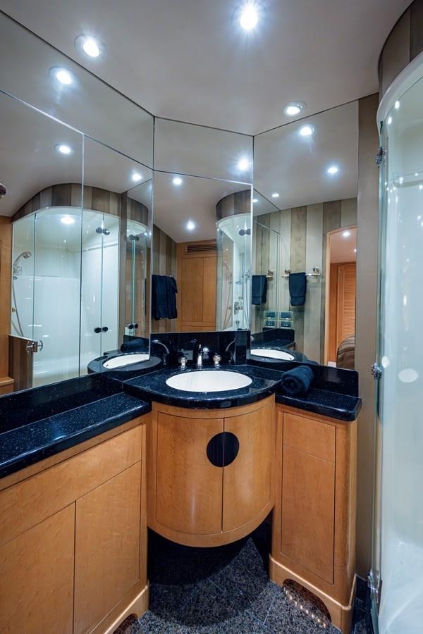 a bathroom with a sink and a mirror aboard DON TEO Yacht for Sale