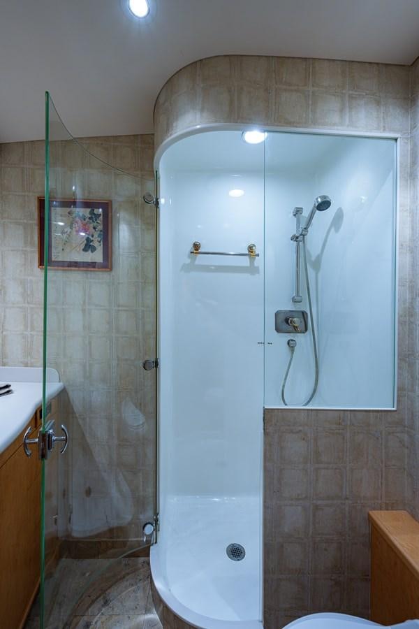 a shower with a glass door aboard DON TEO Yacht for Sale