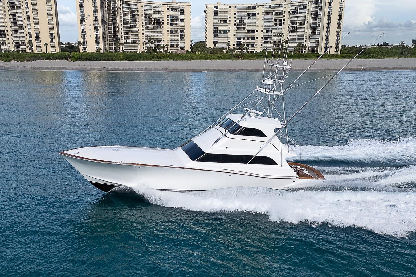 a white boat on water aboard DON TEO Yacht for Sale
