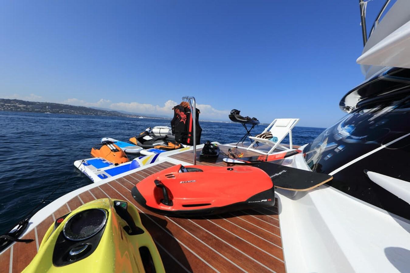 a person standing on a boat aboard BAIA 100 Yacht for Sale