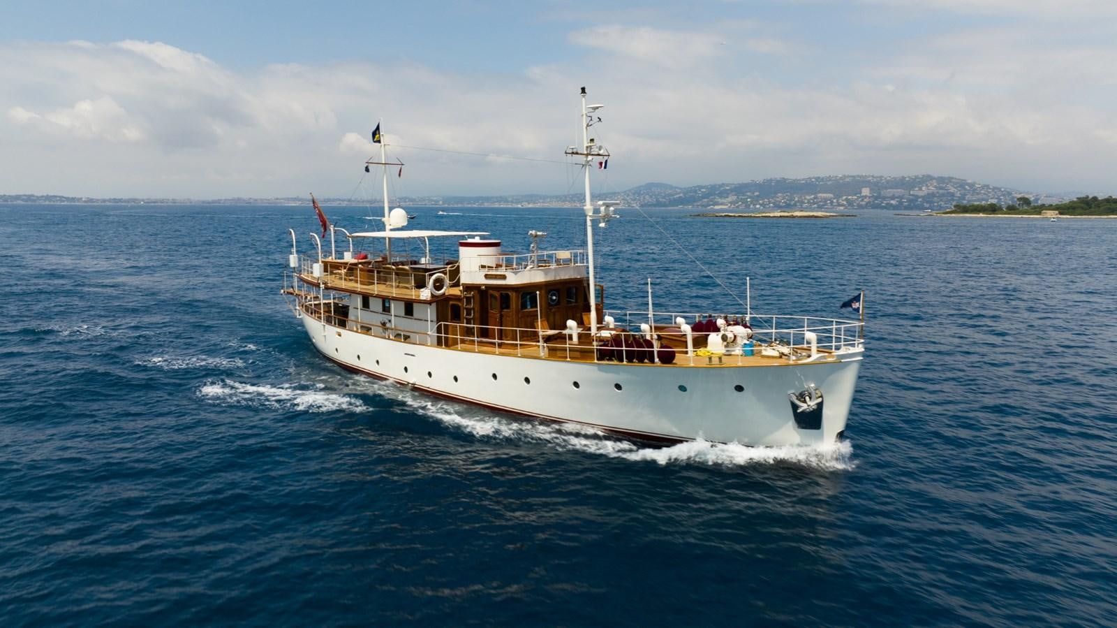 a large ship on the water aboard LADY HERTHA Yacht for Sale