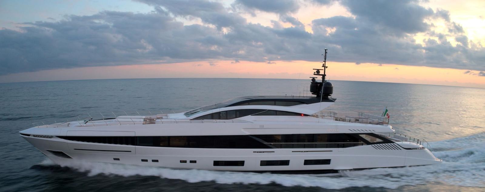 a white yacht on the water aboard GOLDENEYE Yacht for Sale
