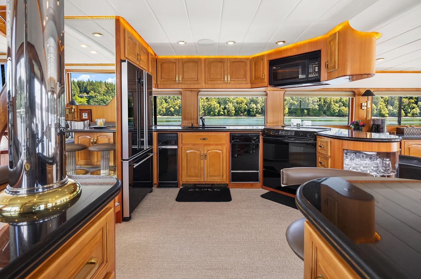 a kitchen with a large glass window aboard QUE SA-RAH SA-RAH Yacht for Sale