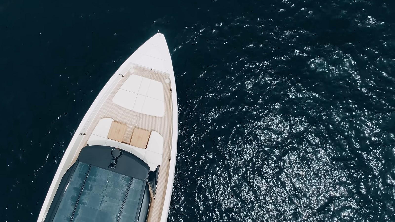 a white house with a black roof aboard ANMAX Yacht for Sale