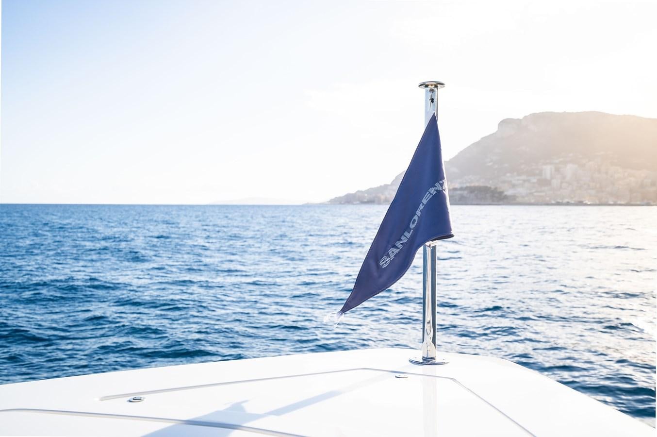 a flag on a boat aboard ANMAX Yacht for Sale