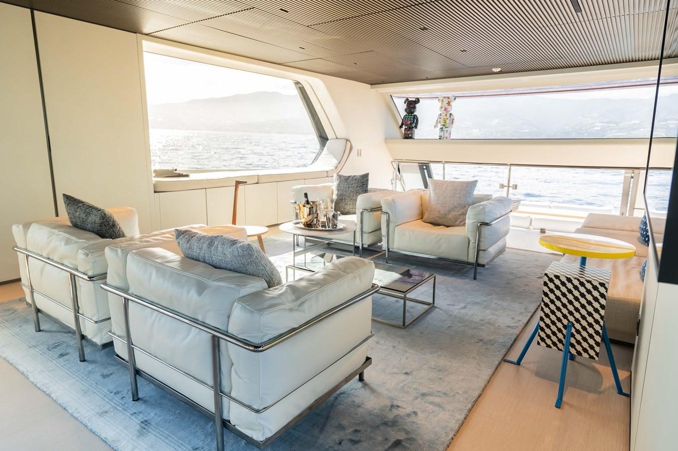 a living room with a large window aboard ANMAX Yacht for Sale