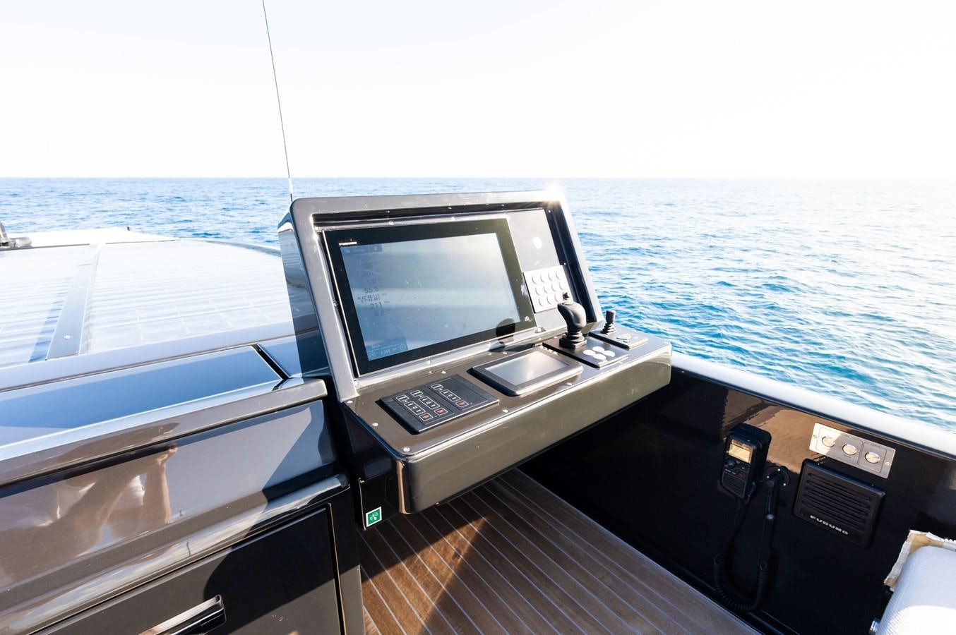 a laptop on a boat aboard ANMAX Yacht for Sale