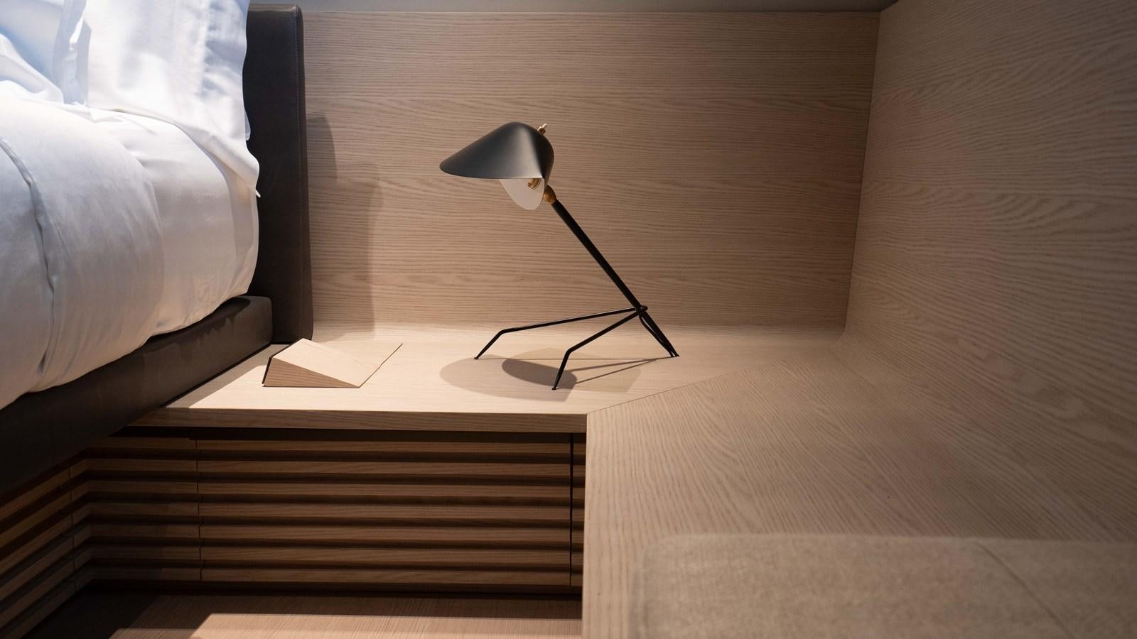 a lamp on a table aboard ANMAX Yacht for Sale