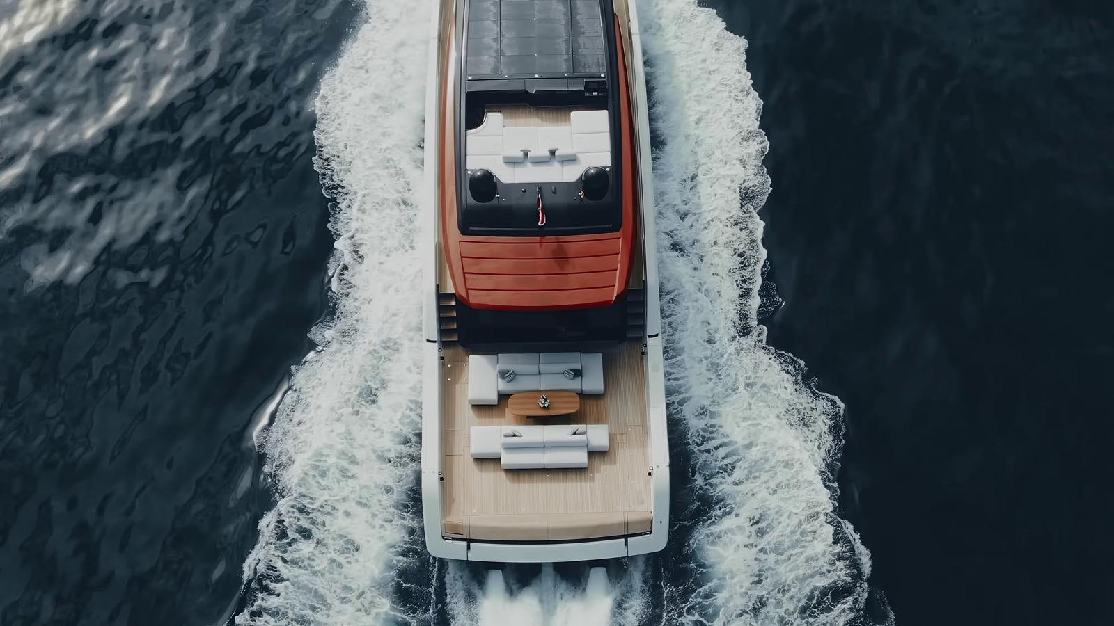 a small wooden boat on a body of water aboard ANMAX Yacht for Sale