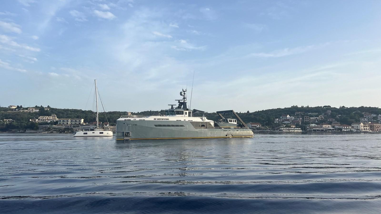 a large ship in the water aboard NO DESTINATION Yacht for Sale