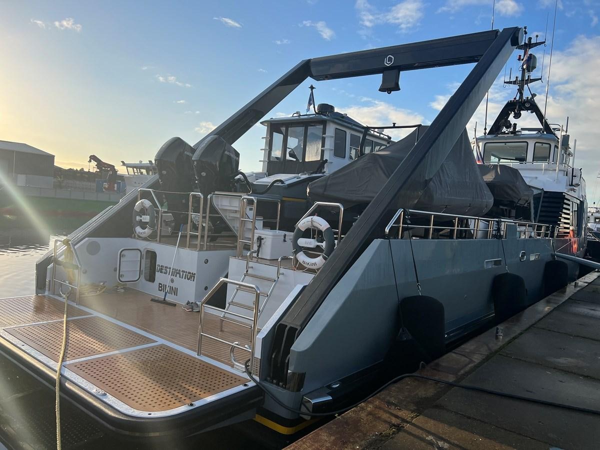 a large boat on a trailer aboard NO DESTINATION Yacht for Sale