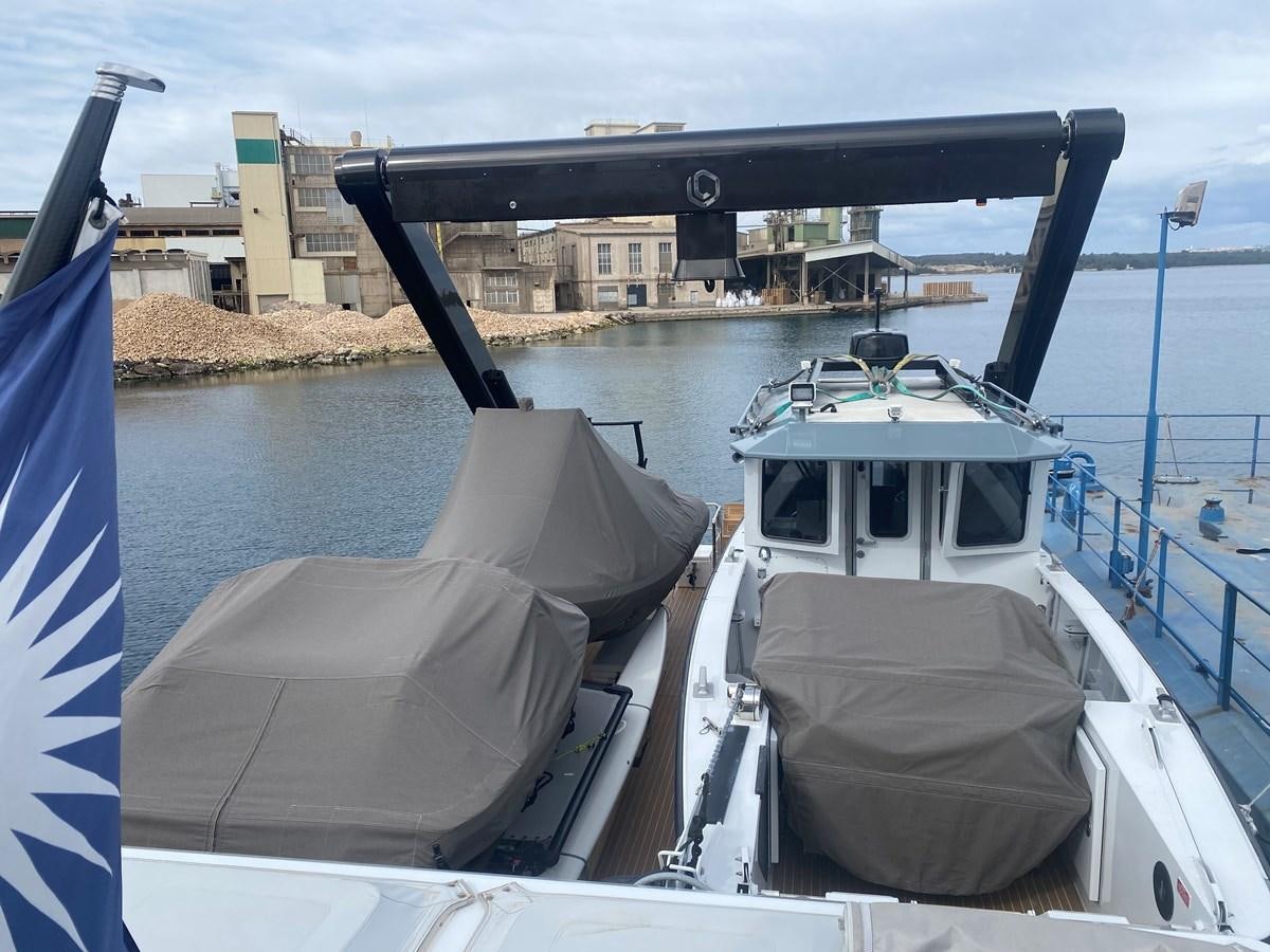 a boat in the water aboard NO DESTINATION Yacht for Sale