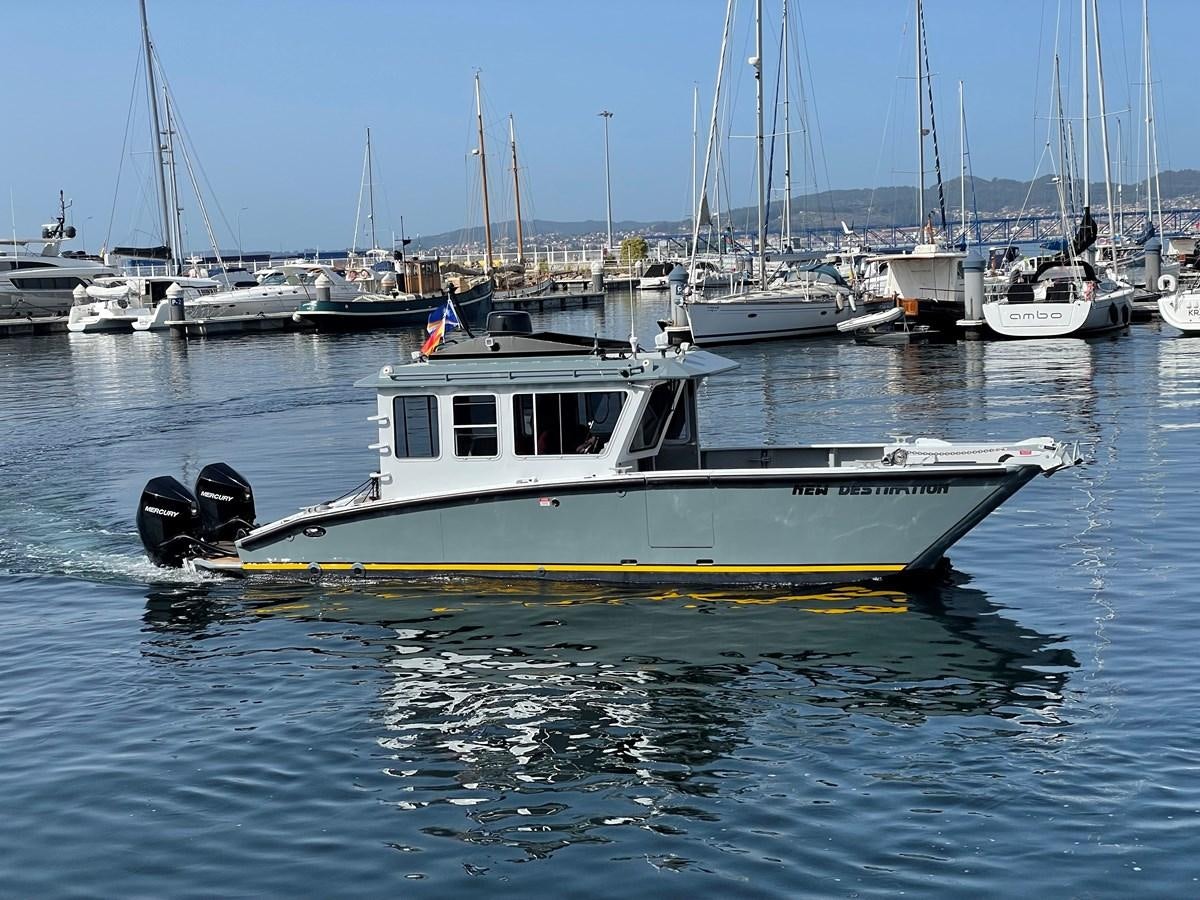 a boat in the water aboard NO DESTINATION Yacht for Sale