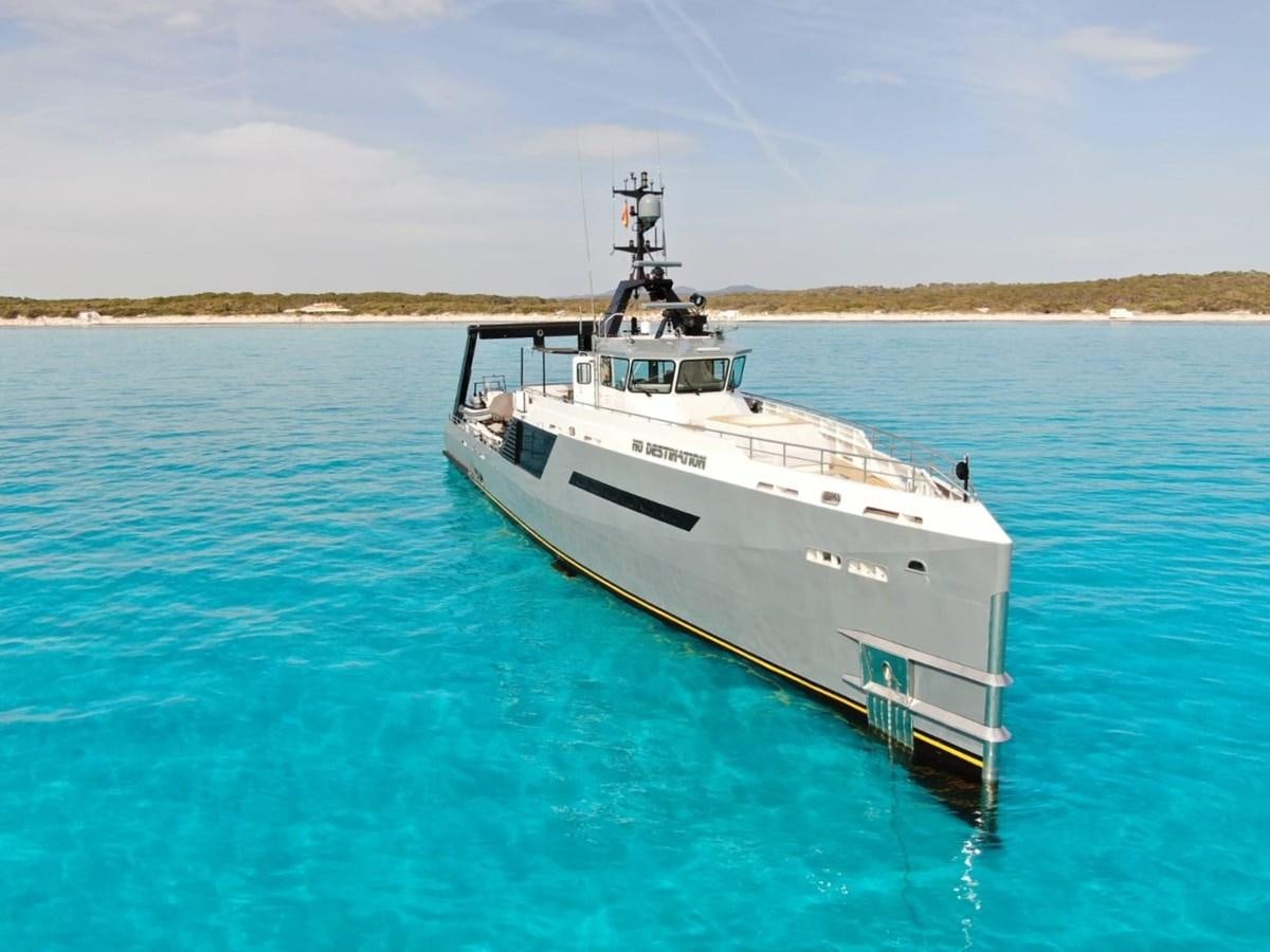 a boat in the water aboard NO DESTINATION Yacht for Sale