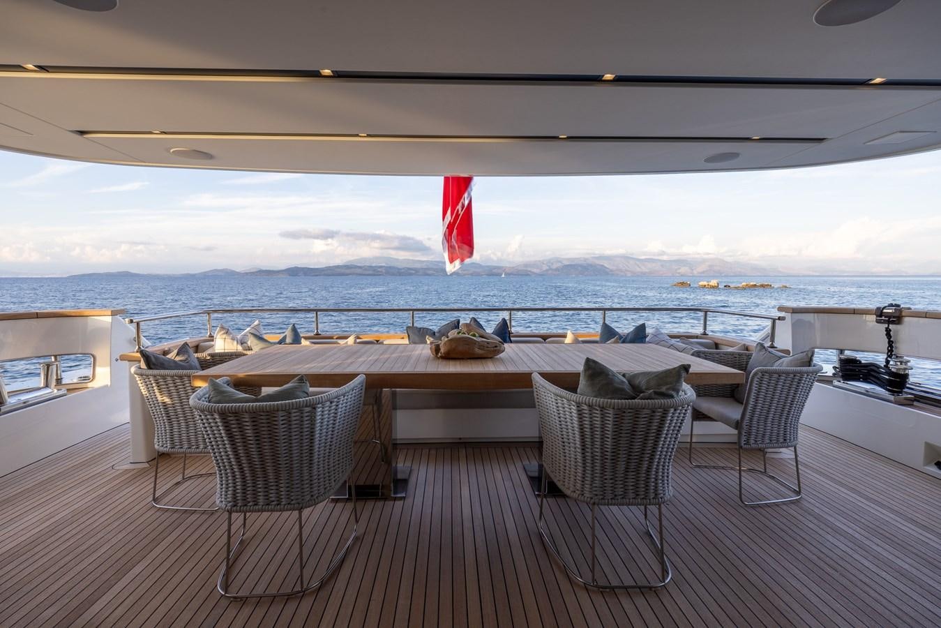 a room with a table and chairs aboard ZULU 3 Yacht for Sale