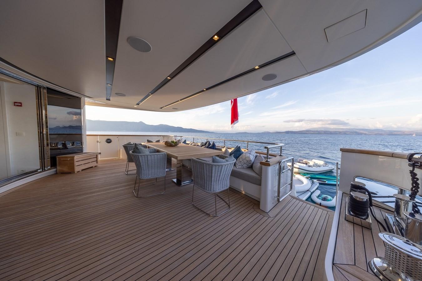 a room with a table and chairs aboard ZULU 3 Yacht for Sale