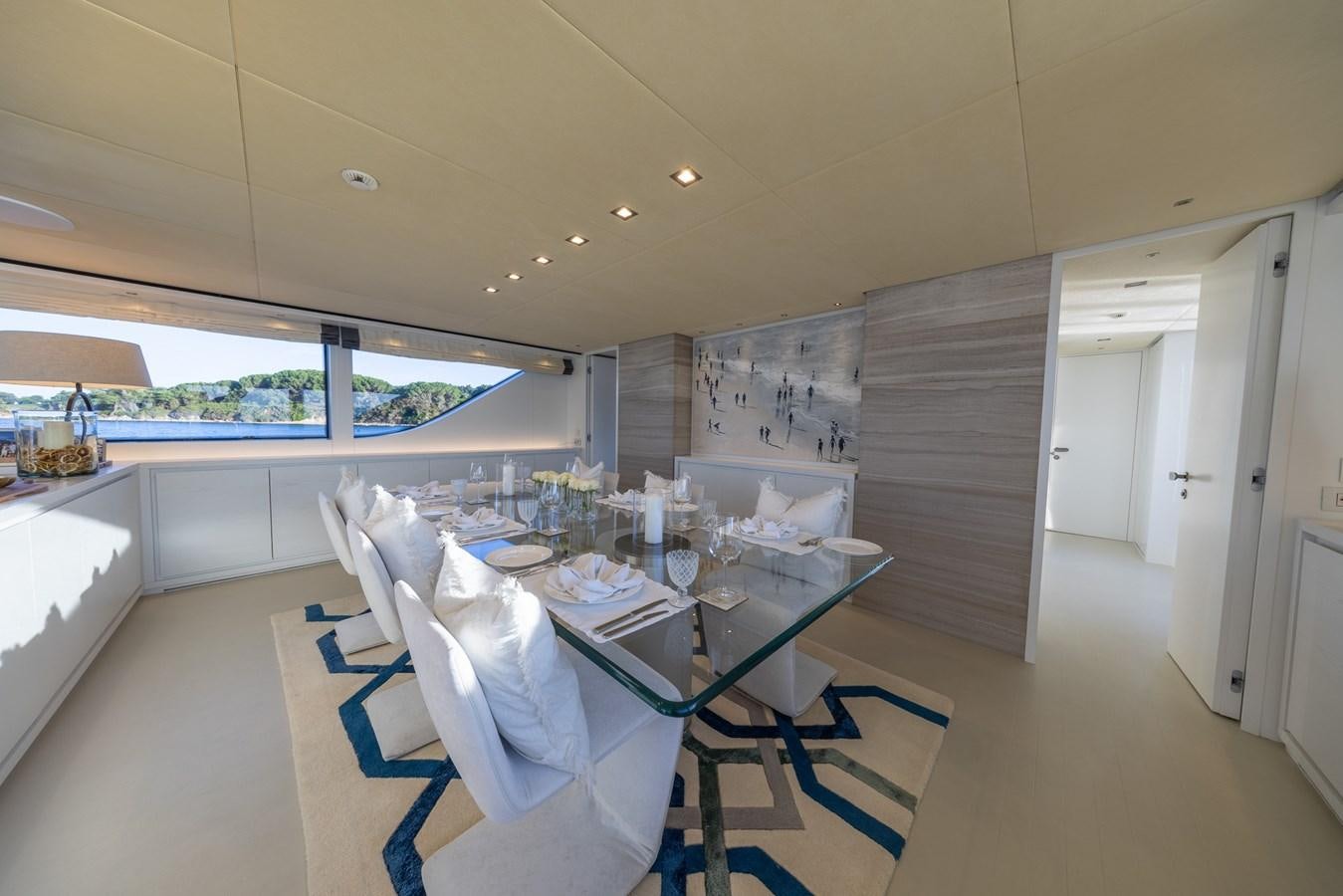 a room with a table and chairs aboard ZULU 3 Yacht for Sale