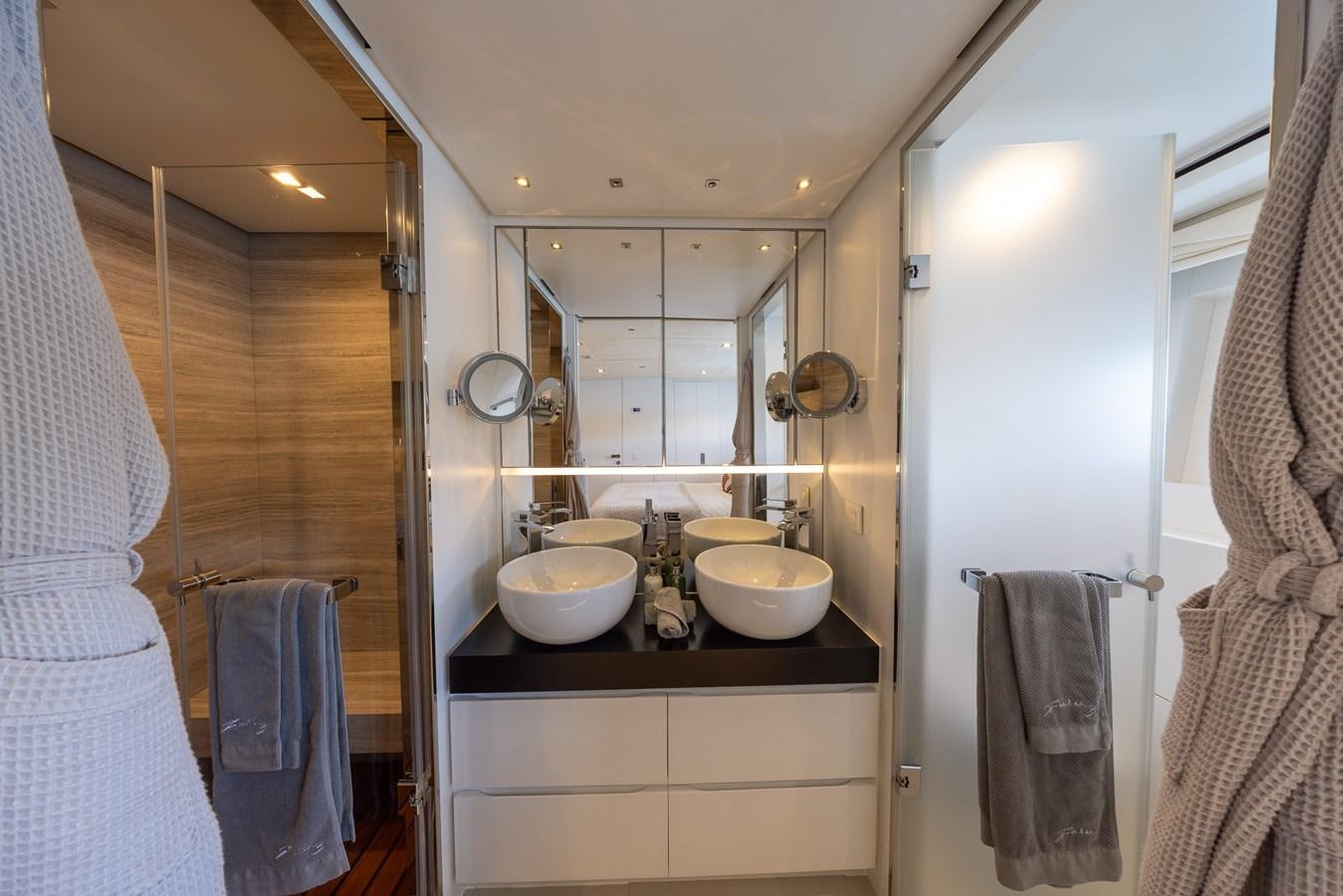 a bathroom with a sink and a mirror aboard ZULU 3 Yacht for Sale