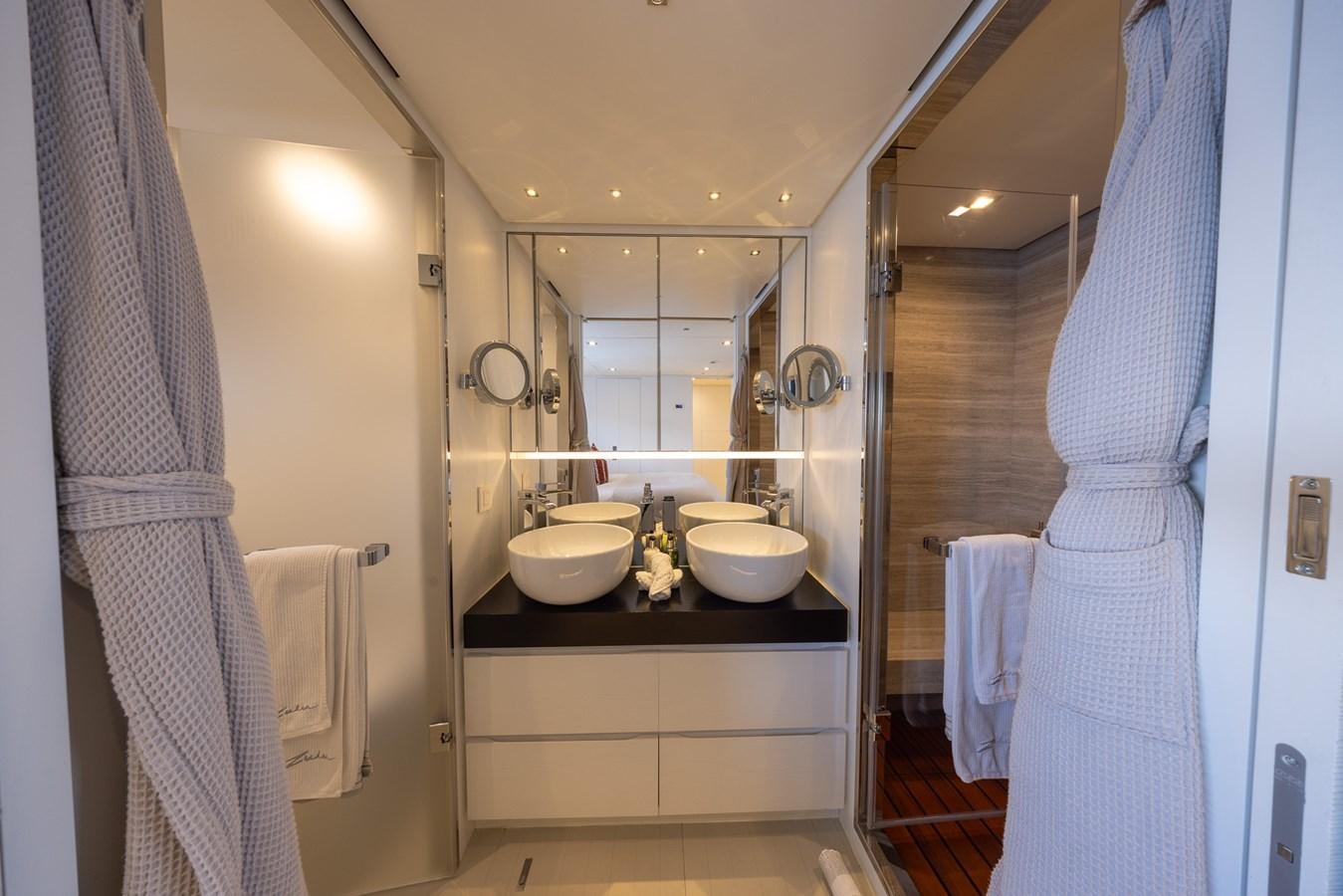 a bathroom with a sink and a mirror aboard ZULU 3 Yacht for Sale