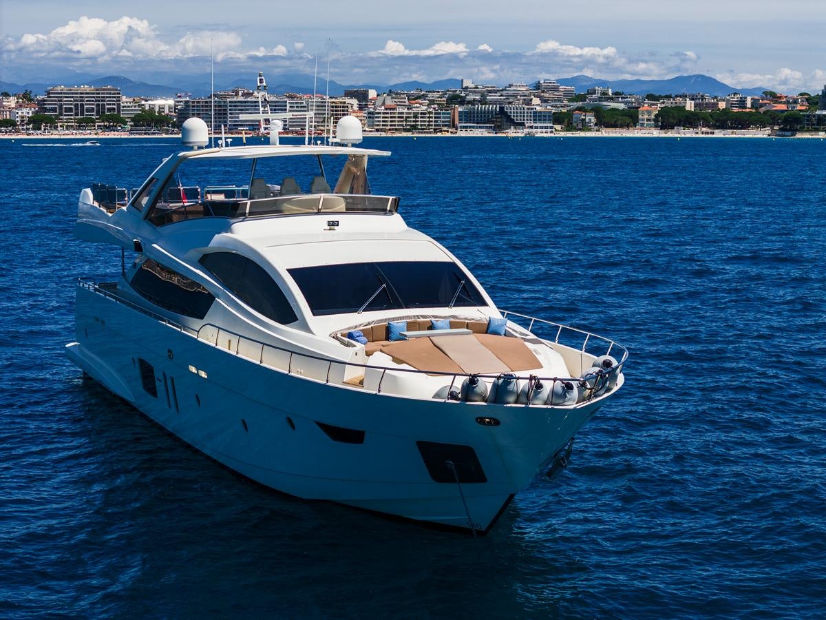 a white boat in the water aboard GRACE Yacht for Sale