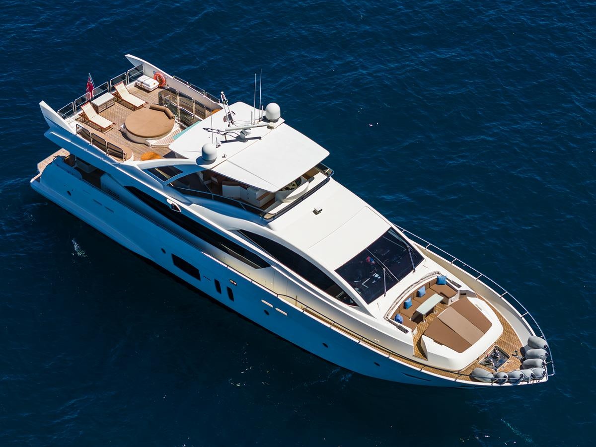 a white boat on the water aboard GRACE Yacht for Sale