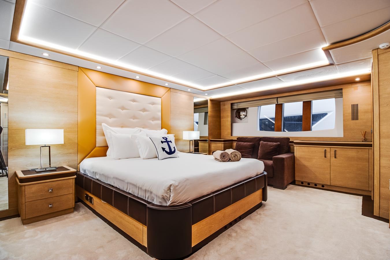 a large bedroom with a bed aboard GRACE Yacht for Sale