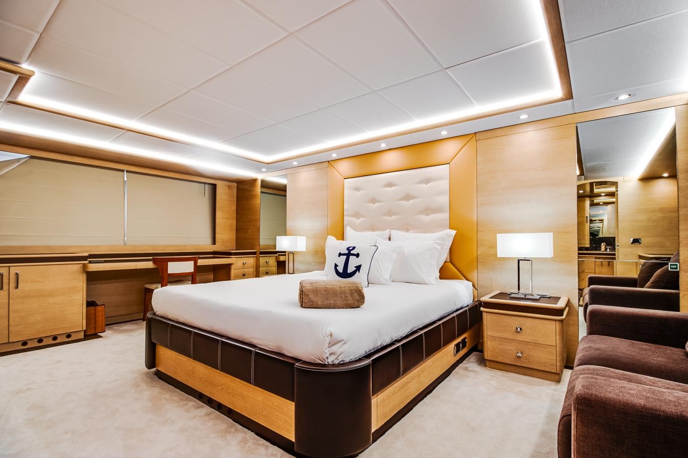a large bed in a hotel room aboard GRACE Yacht for Sale