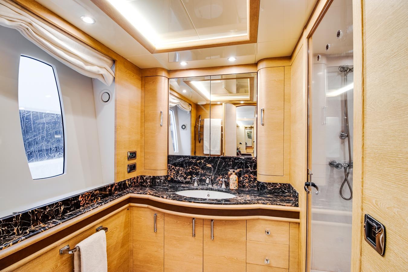 a bathroom with a marble counter top aboard GRACE Yacht for Sale