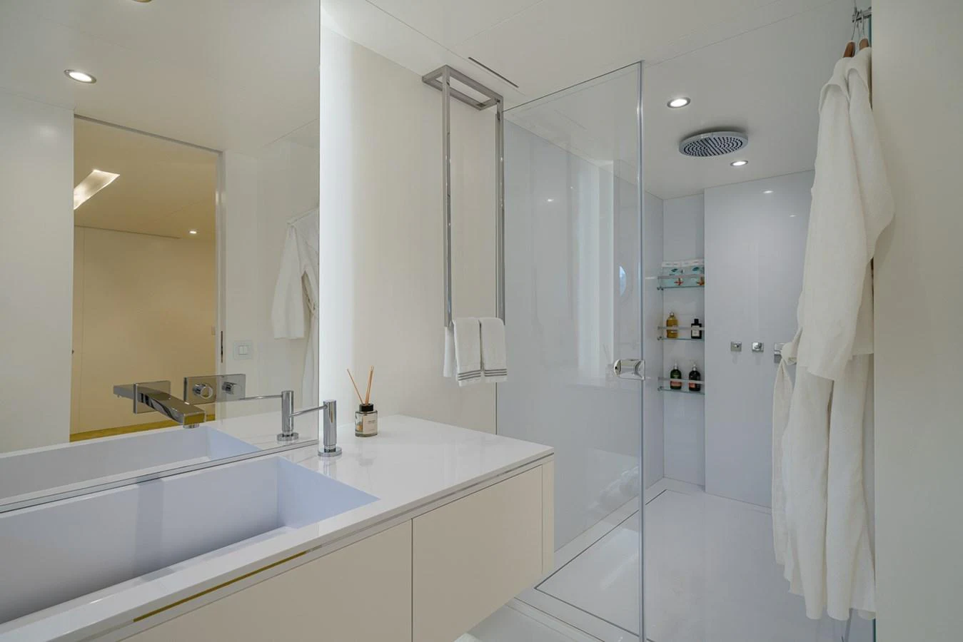 a bathroom with a large mirror aboard ESOSH Yacht for Sale