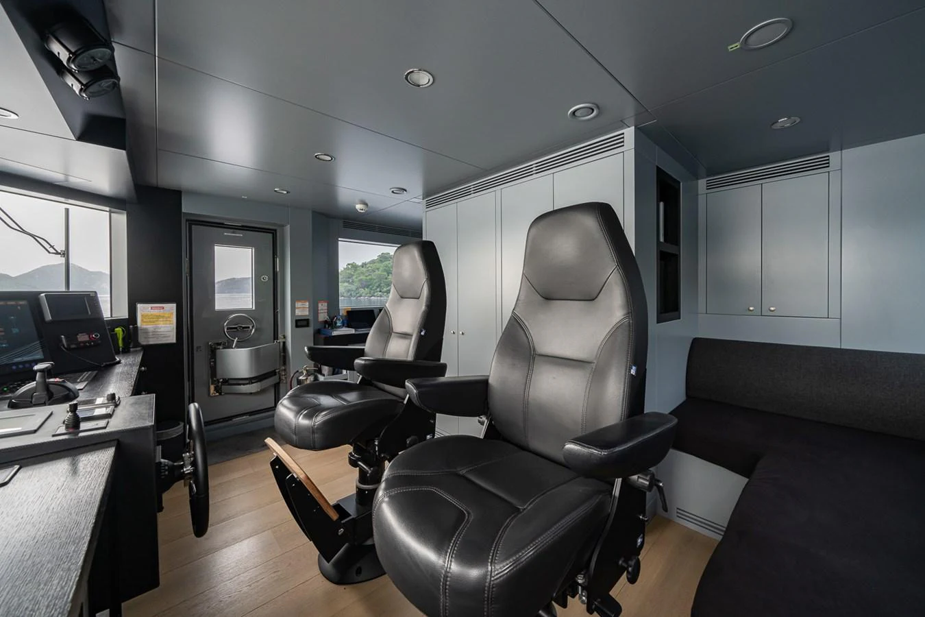 a room with a couch and a desk aboard ESOSH Yacht for Sale