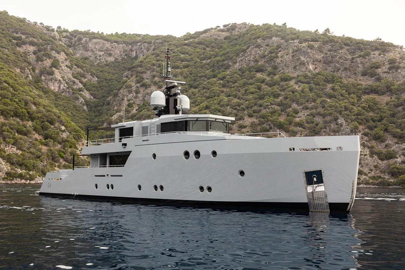 a large white boat in the water aboard ESOSH Yacht for Sale