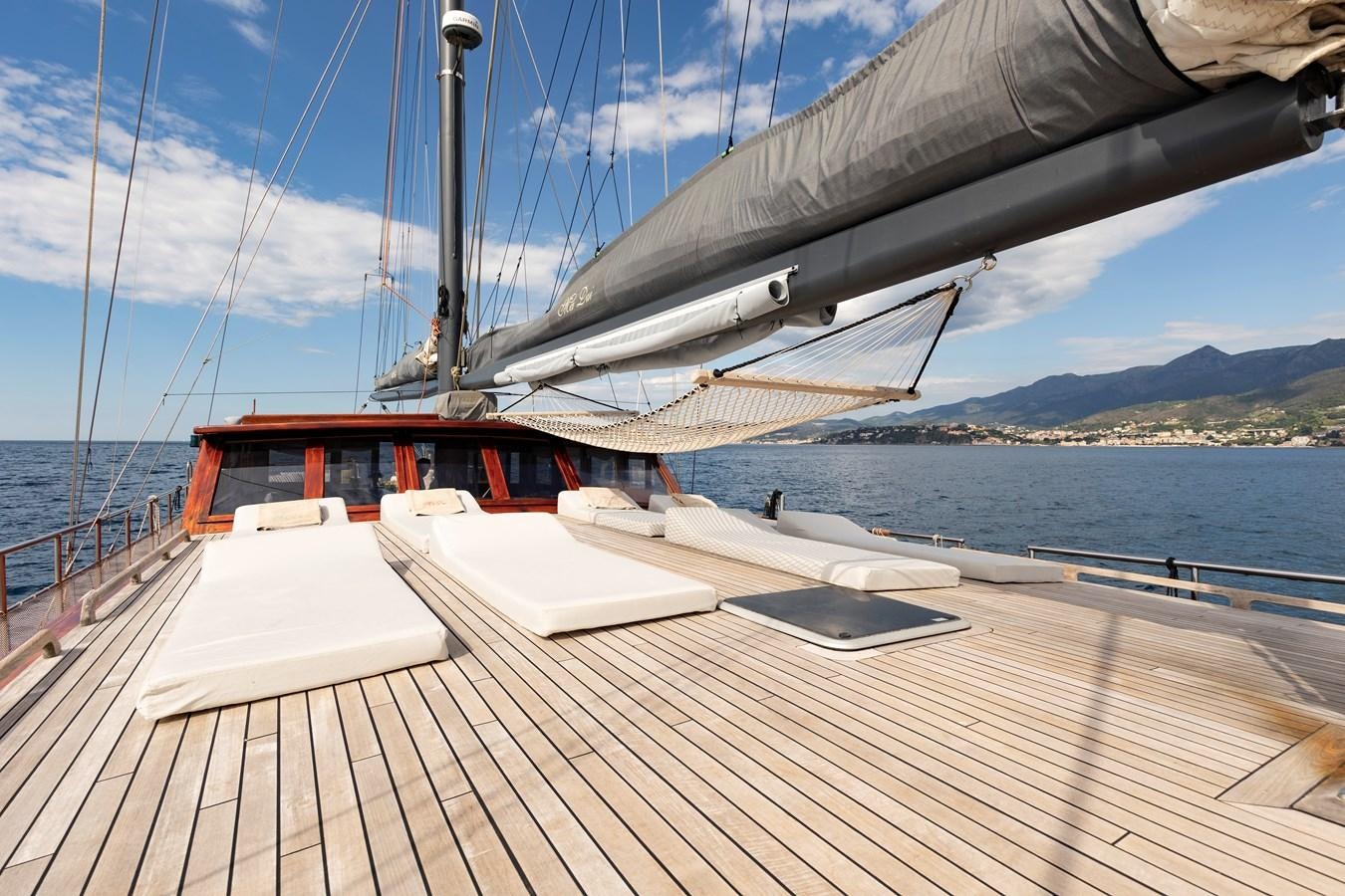 a boat on a deck aboard DAI Yacht for Sale