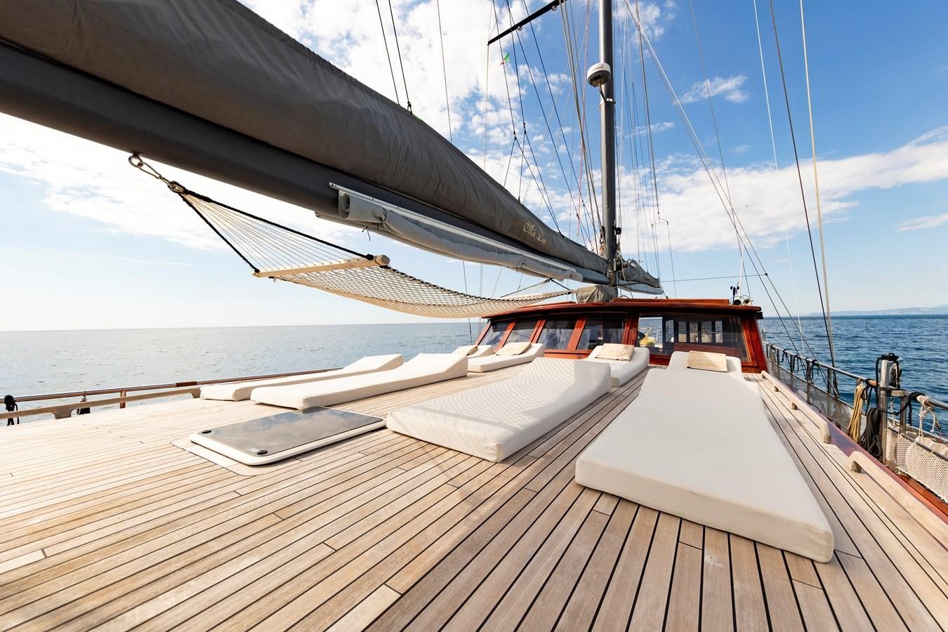a boat on a deck aboard DAI Yacht for Sale