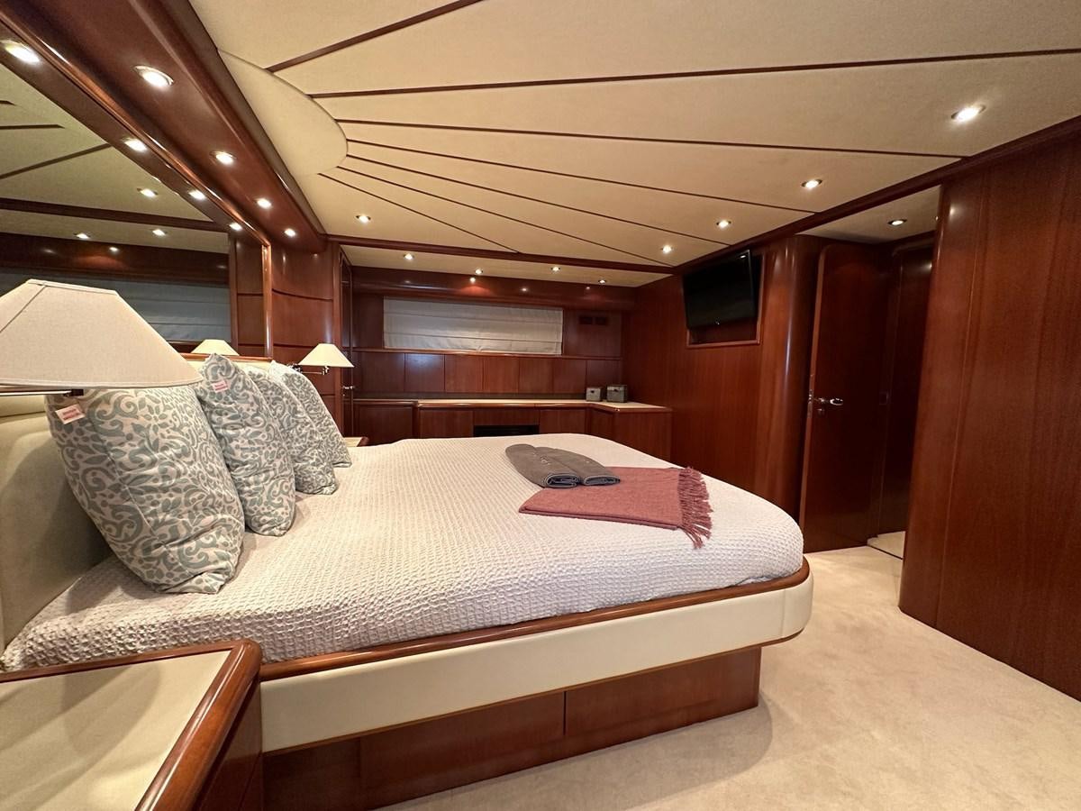 a bed in a hotel room aboard VIDA LOCA Yacht for Sale
