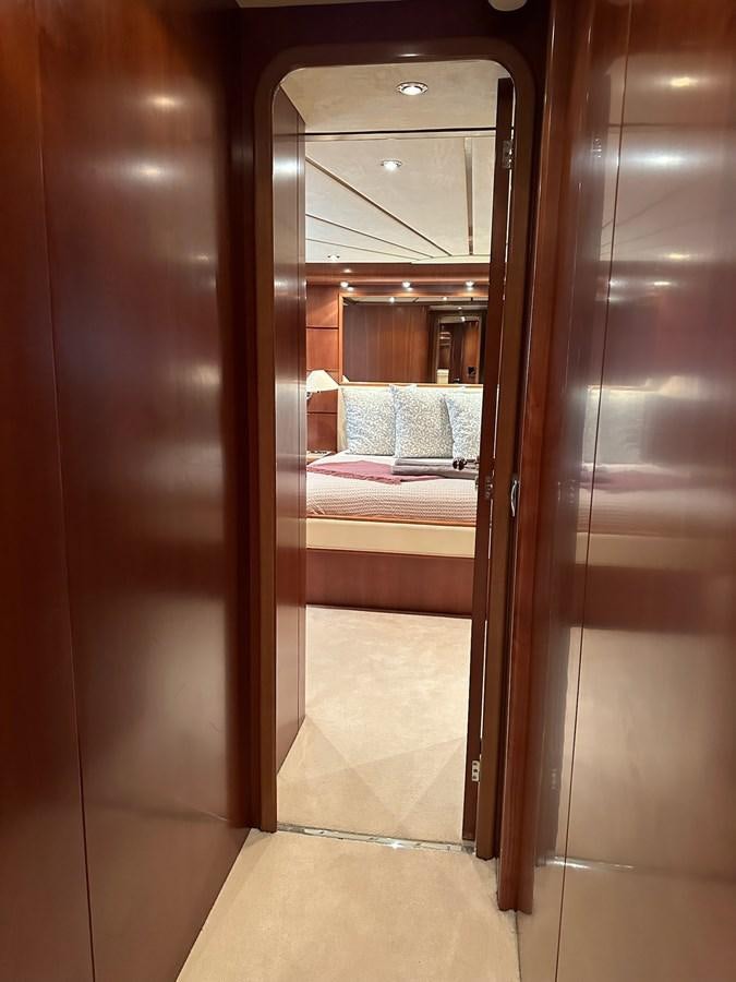 a mirror showing a bed aboard VIDA LOCA Yacht for Sale